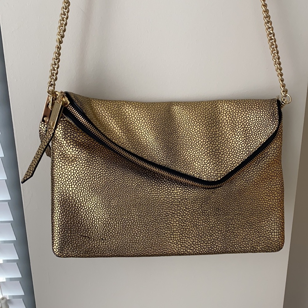 Henri Bendel crossbody, clutch with magnetic clips